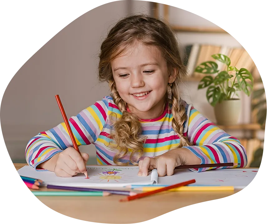 Niña con apoyo educativo en Madrid — becas y ayudas para familias